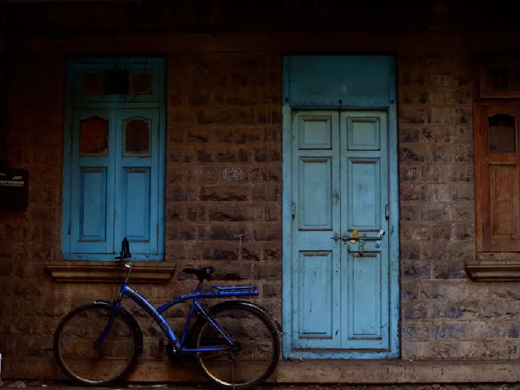 blue-door-and-blue-cycle