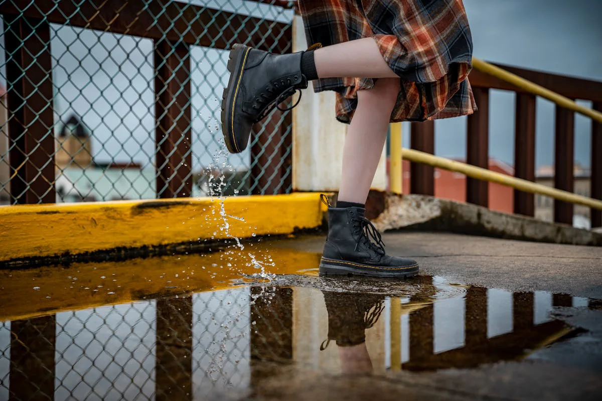 freyoung-person-splashing-water-in-urban-setting